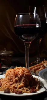 Romantic dinner setting with wine and spaghetti.