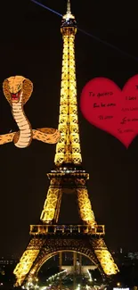 Eiffel Tower at night with a red heart and snake design.