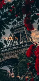 Romantic Eiffel Tower with red roses at sunset.