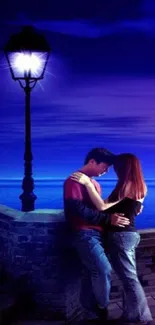 Romantic couple under streetlamp with ocean view.