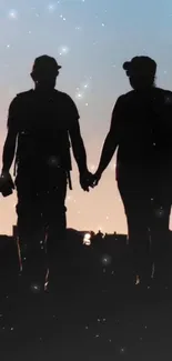 Silhouette couple under starlit sky wallpaper.