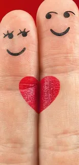 Cute finger art with smiling faces and heart symbol on red background.