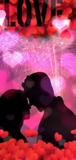 Silhouetted couple with fireworks and hearts in love theme wallpaper.