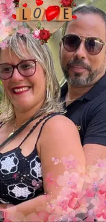 Romantic couple with floral decorations and love inscription on wallpaper.