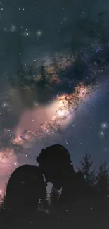 Silhouette couple under a galaxy sky stars wallpaper.