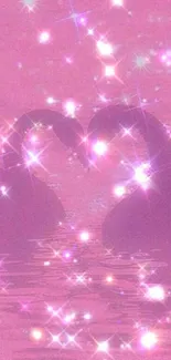 Romantic pink swans creating a heart with glitter.