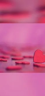 Romantic pink heart wallpaper with soft focus and vibrant colors.