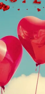 Red heart balloons floating in a blue sky with scattered clouds.