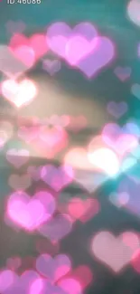 Romantic heart-shaped bokeh wallpaper with pink and teal hues.