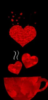 Red heart-shaped steam from coffee cup on black background.
