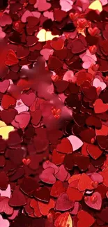 Red and pink heart confetti wallpaper perfect for romantic settings.