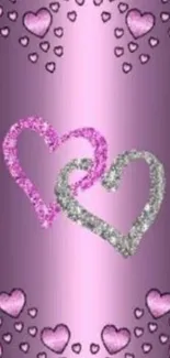 Glitter hearts on a soft purple background, perfect for a romantic mobile wallpaper.