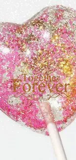 Heart-shaped pink and gold glittery lollipop with 'Together Forever' message.