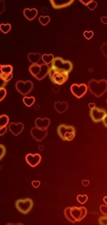 Romantic glow wallpaper with red and orange hearts.