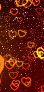 Mobile wallpaper with glowing orange hearts and sparkling background.