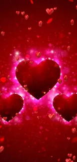 Three glowing red hearts on a vibrant background.