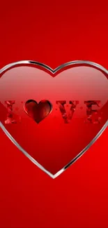 Glossy red heart with the word 'Love' on a red background.