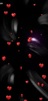 Mobile wallpaper with red hearts on black background.