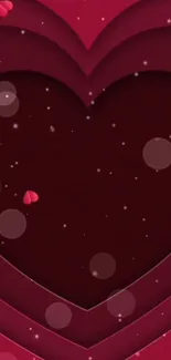 Romantic maroon heart wallpaper with falling pink petals.