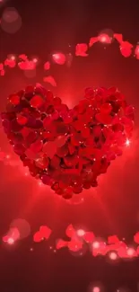 Romantic heart shape made of red petals glowing on a dark background.