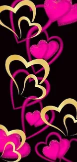 Vibrant neon pink and gold heart pattern on black background wallpaper.