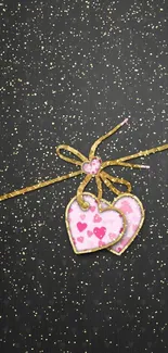 Romantic mobile wallpaper with hearts and gold ribbon.