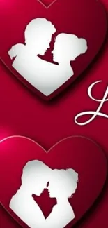 Romantic red heart wallpaper with couple silhouettes.