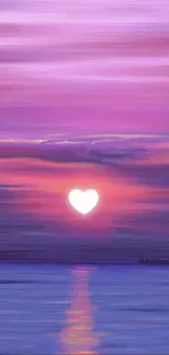 Heart-shaped sunset over a calm ocean with purple skies.