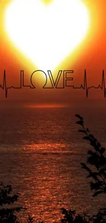 A sunset with a heart shape and the word 'LOVE' over an ocean view.