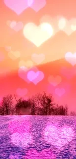 Heart bokeh over pink-orange sunset landscape.