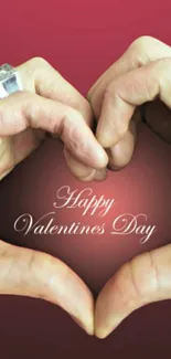 Hands forming a heart with 'Happy Valentine's Day' text on red background.