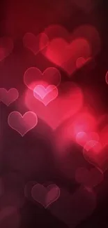 Romantic mobile wallpaper with glowing red hearts.