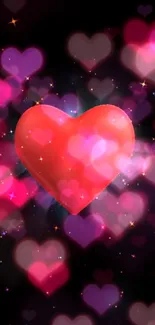 A vibrant red heart with pink hues on a dark background.