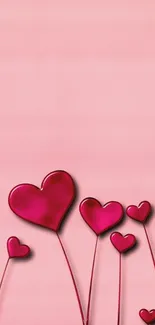 Romantic pink wallpaper with red hearts.