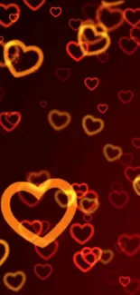 Romantic heart wallpaper with glowing red and orange hearts.