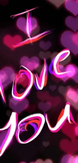 Vibrant 'I love you' wallpaper with pink hearts.