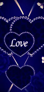 Blue wallpaper with jeweled hearts and butterflies saying Love.