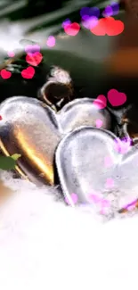 Romantic wallpaper with metallic hearts and colorful bokeh.