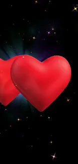 Two red hearts with sparkling stars in a black background wallpaper.