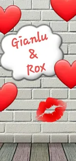 Mobile wallpaper with red hearts and lips on a white brick wall.