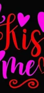 Romantic 'Kiss Me' wallpaper with red and pink hearts.