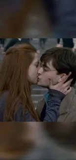 A romantic kiss on stairs, perfect for wallpaper.