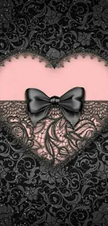 Pink lace heart with black bow wallpaper.