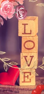 Love-themed wallpaper with wooden blocks, red heart, and pink roses.