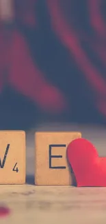 Romantic Scrabble love wallpaper with red heart.