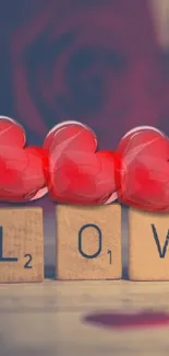 Romantic wallpaper with LOVE blocks and red hearts.