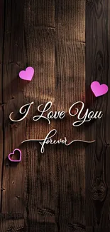 Romantic 'I Love You Forever' wallpaper with purple hearts on a wooden background.