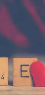Romantic mobile wallpaper with scrabble tiles and heart.