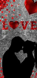 Romantic couple silhouette with red hearts and LOVE text on textured background.