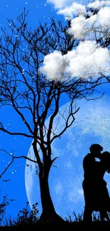 Silhouette of couple kissing under a moonlit blue sky with clouds and tree.